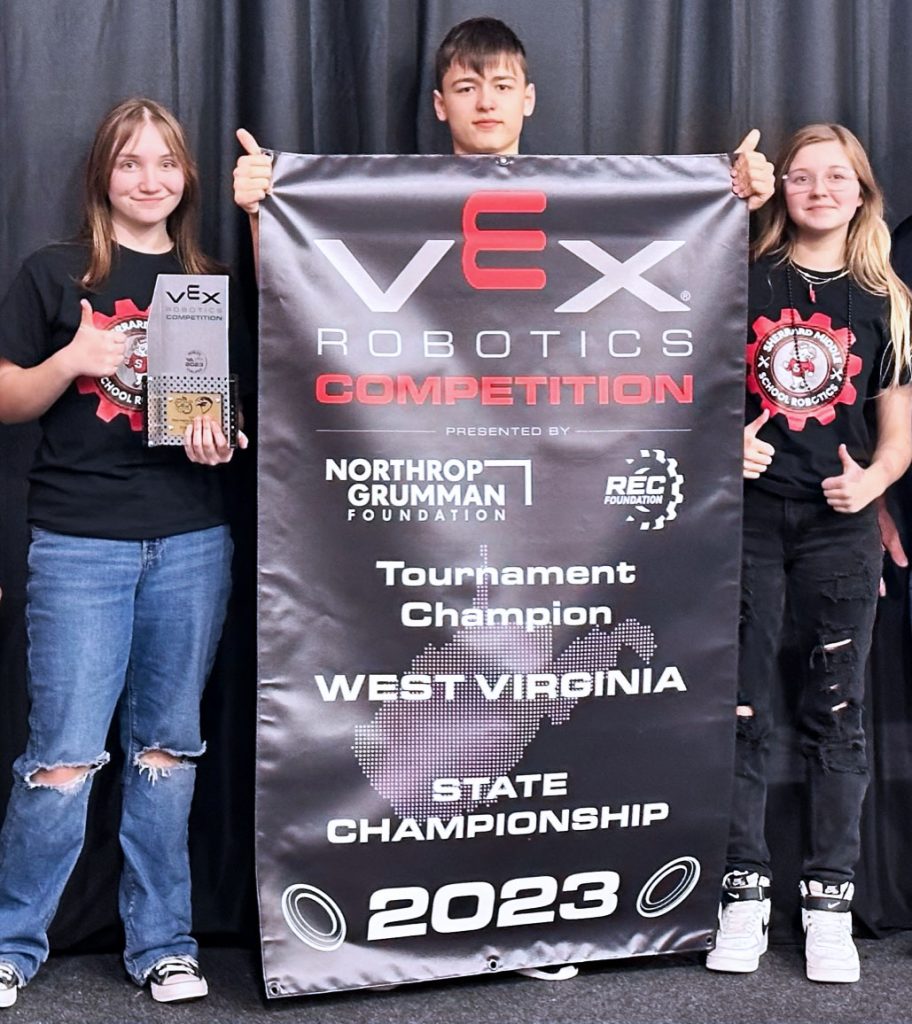 Pictured from left: Sherrard Middle School students Sophie Cunningham, Knox Wilson and Lilly Bergen captured the state title on Saturday at the West Virginia VEX Robotics Competition, presented by the Northrop Grumman Foundation and the REC Foundation.
